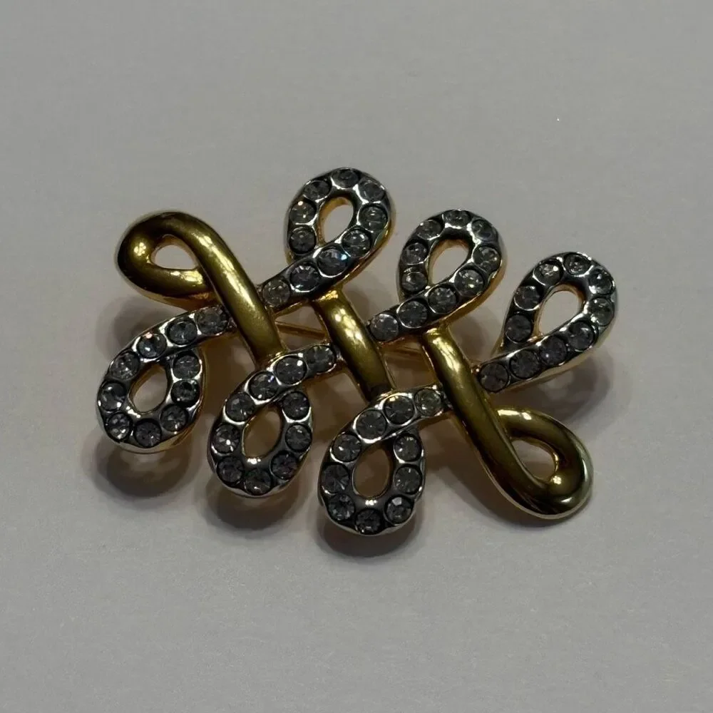 Vintage Swarovski Brooch Clear Crystals Gold Tone Swirl Twist Brooch